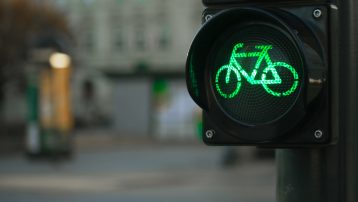 Sustainable transport. Bicycle traffic signal, green light, road bike, free bike zone or area, bike sharing